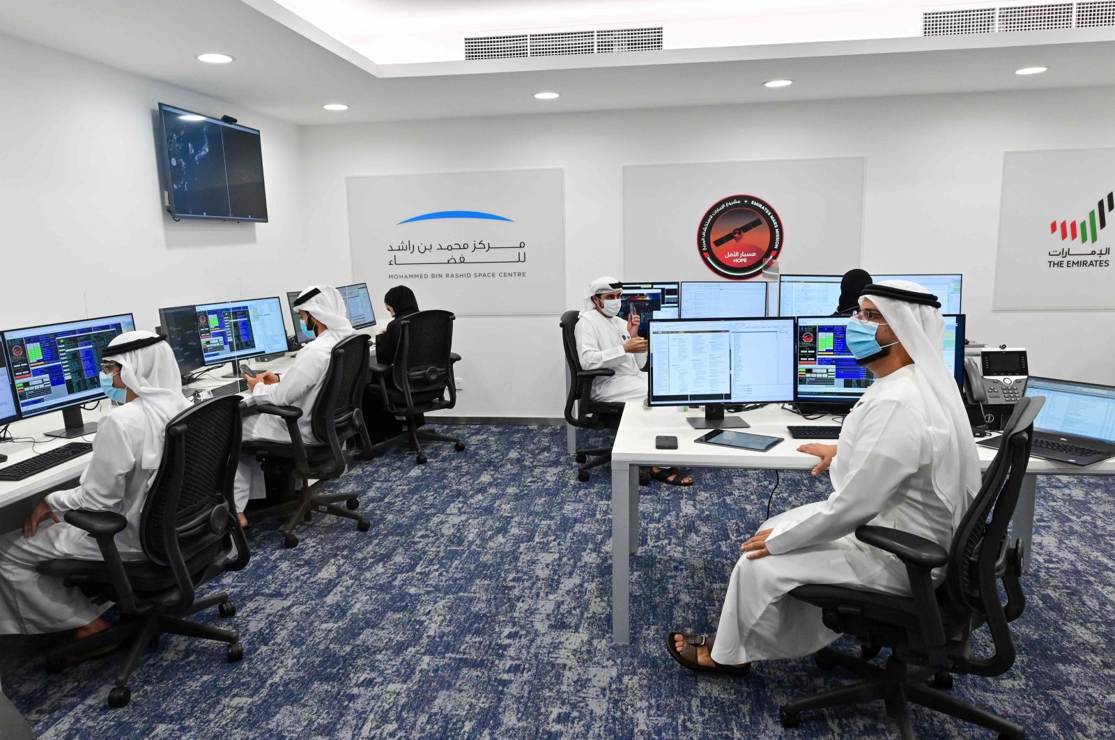 Staff work at the Mohammed Bin Rashid Space Centre in Dubai, ahead of the expected launch of the "Hope" Mars probe from Japan, July 19, 2020. (AFP Photo)