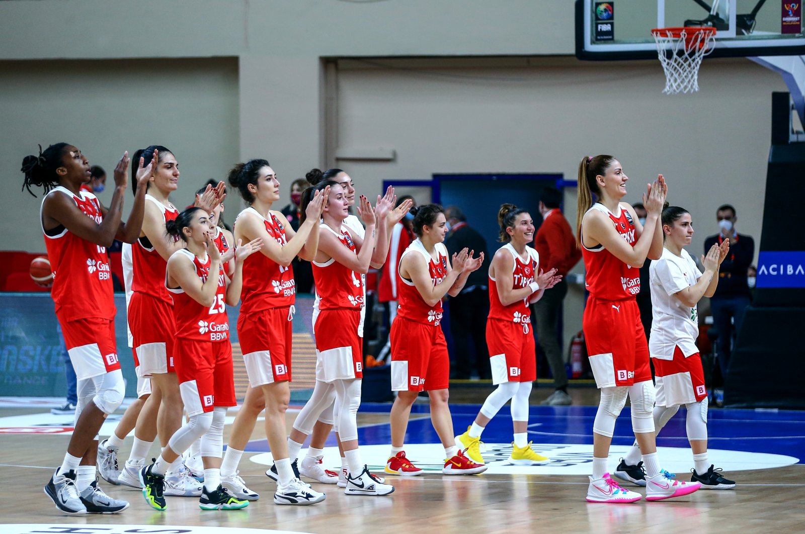The Turkish Women’s National Basketball Team celebrates winning its Group E Women's EuroBasket 2021 qualifiers match against Lithuania at the Ahmet Cömert Sports Center, Istanbul, Turkey, Feb. 4, 2021. (AA Photo)