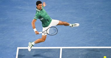 Novak Djokovic in action against Jeremy Chardy in his first-round Australian Open match at Melbourne Park, Melbourne, Australia, Feb. 8, 2021.  (EPA Photo)