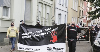 Right-wing protesters carry a banner that reads “Multiculture kills, stop foreign infiltration,” in Worms, Rhineland-Palatinate, Germany, June 6, 2020. (Getty Images)