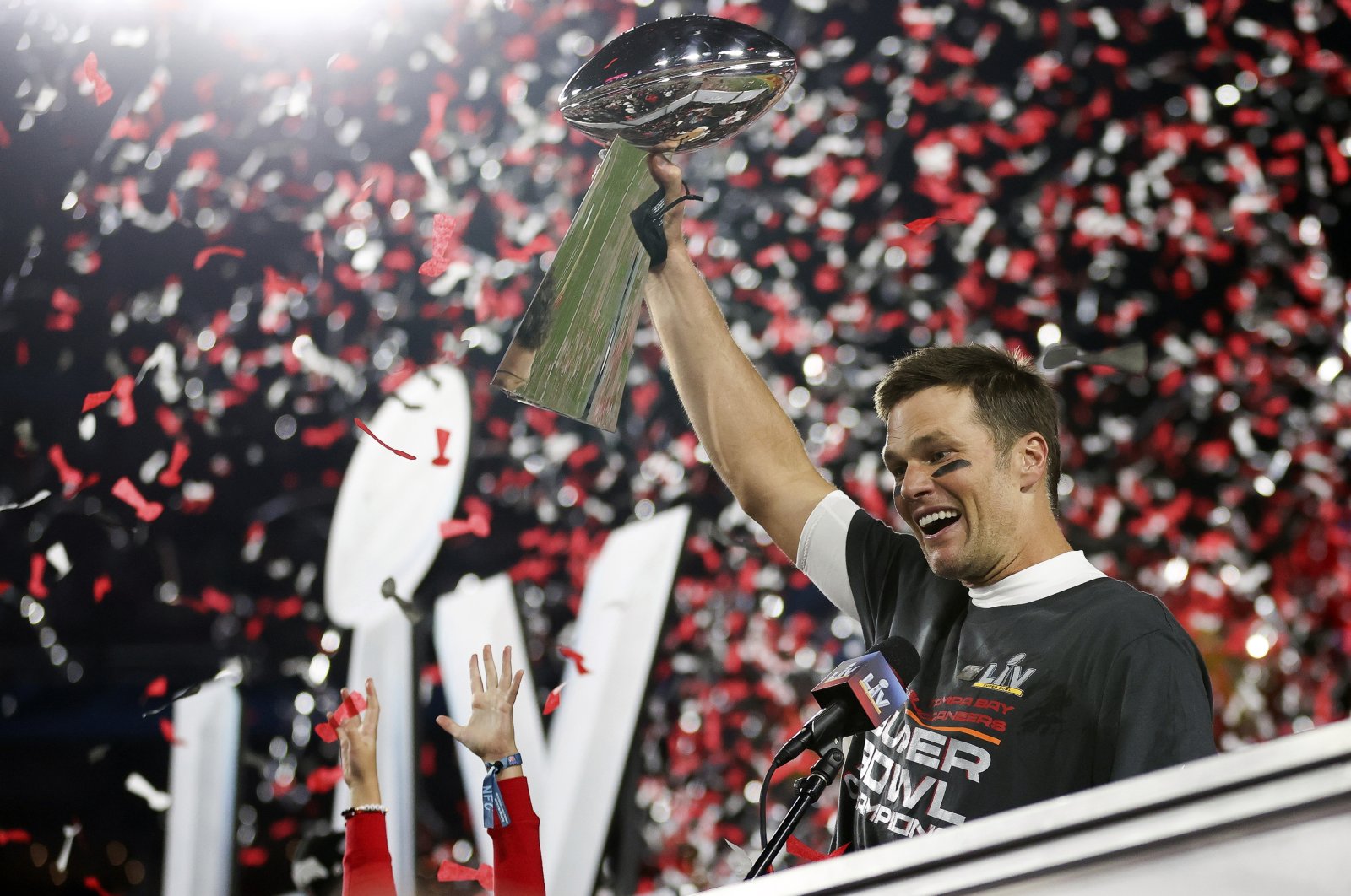 Tampa Bay Buccaneers quarterback Tom Brady (12) holds the Vince Lombardi trophy following the NFL Super Bowl 55 football game against the Kansas City Chiefs, Sunday, Feb. 7, 2021, in Tampa, Fla. Tampa Bay won 31-9. (Ben Liebenberg via AP)