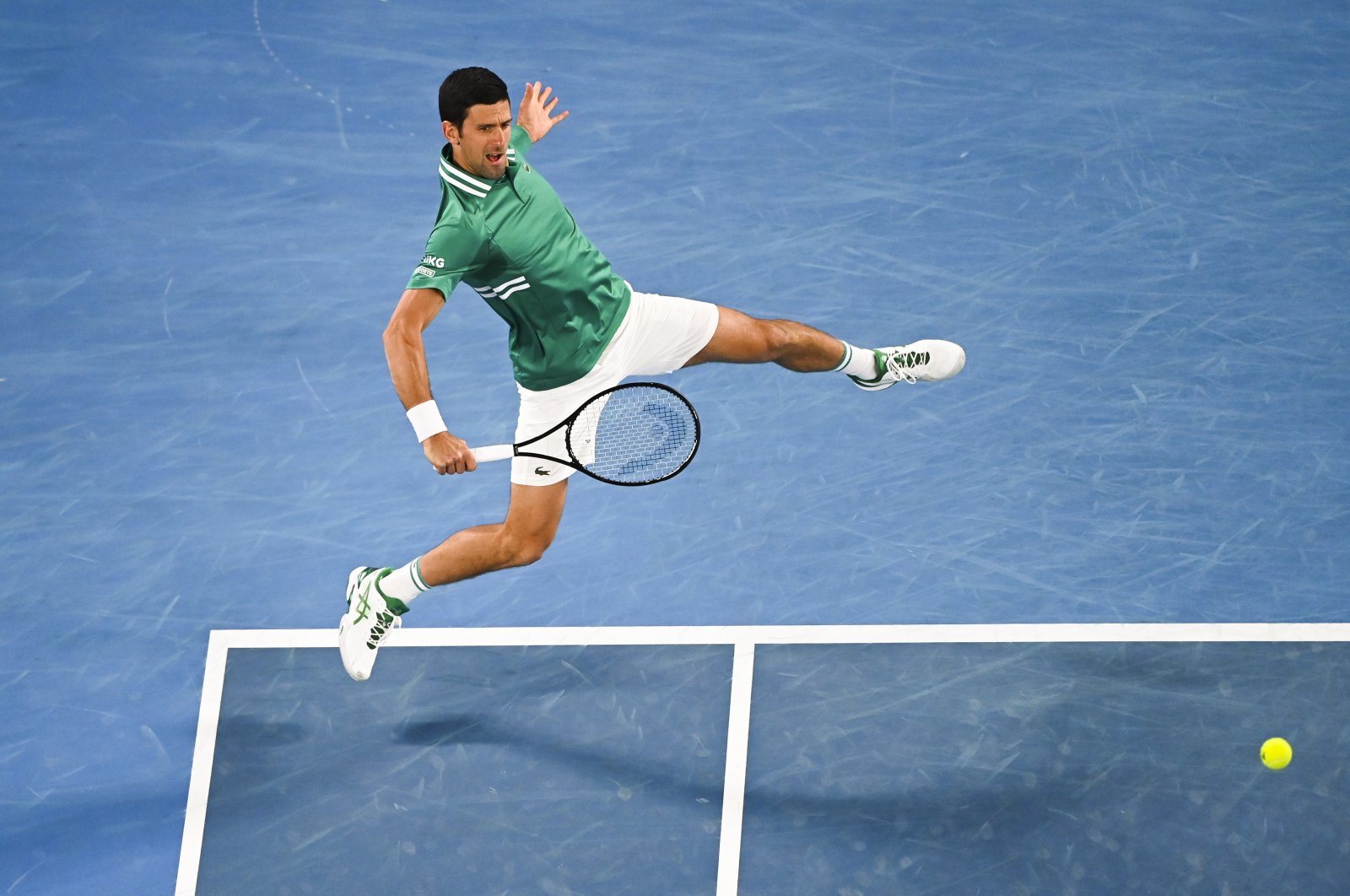 Novak Djokovic in action against Jeremy Chardy in his first-round Australian Open match at Melbourne Park, Melbourne, Australia, Feb. 8, 2021.  (EPA Photo)
