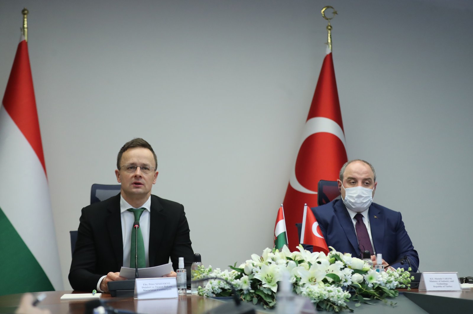 Hungarian Minister of Foreign Affairs and Trade Peter Szijjarto (L) and Turkey’s Industry and Technology Minister Mustafa Varank speak during a news conference, Ankara, Turkey, Feb. 8, 2021.