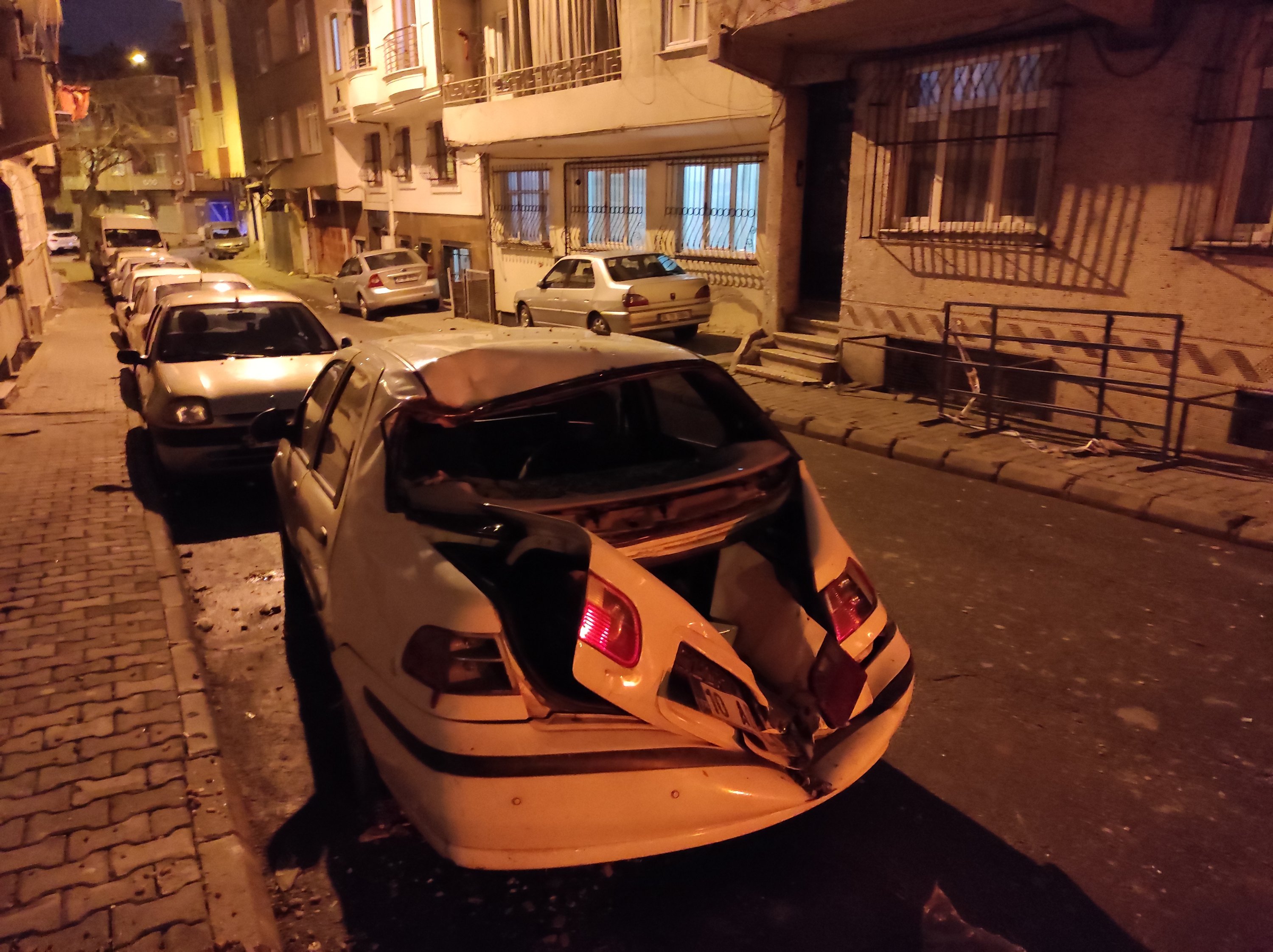 A car damaged by falling objects is seen in the aftermath of a storm that hit Istanbul, Turkey, Jan. 9, 2021. (AA Photo)