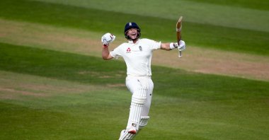 England's Joe Root celebrates his century during day four of the fifth Test match between England and India at the Kia Oval in London, England, Sept. 10, 2018. (Getty Images)