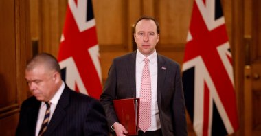 Britain's Health Secretary Matt Hancock (R) and Deputy Chief Medical Officer for England Jonathan Van-Tam attend a virtual news conference at 10 Downing Street in London, Britain Feb. 8, 2021. (Reuters)