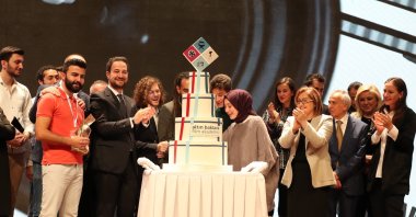 Winners of the Golden Baklava Film Academy Fifth International Student Film Festival cut a cake at the celebration in Gaziantep, southeastern Turkey, 2019.