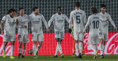 Real Madrid's Ferland Mendy (C) celebrates after scoring his side's second goal during a La Liga match against Getafe at Alfredo di Stefano Stadium, Madrid, Spain, Feb. 9, 2021. (AP Photo)