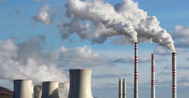 White smoke is emitted from a coal power plant. (Shutterstock Photo)