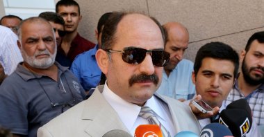 Zekeriya Öz speaks to reporters outside a courthouse in Istanbul, Turkey, Aug. 6, 2014. (AA Photo)