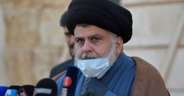 Iraqi cleric Moqtada al-Sadr delivers a statement in support of the early elections outside of his home in Iraq's holy city Najaf, on Feb.10, 2021. (AFP Photo)