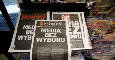 The first pages of Poland's main private newspapers featuring black front pages with the slogan "Media without choice", Warsaw, Poland Feb. 10, 2021. (Reuters)