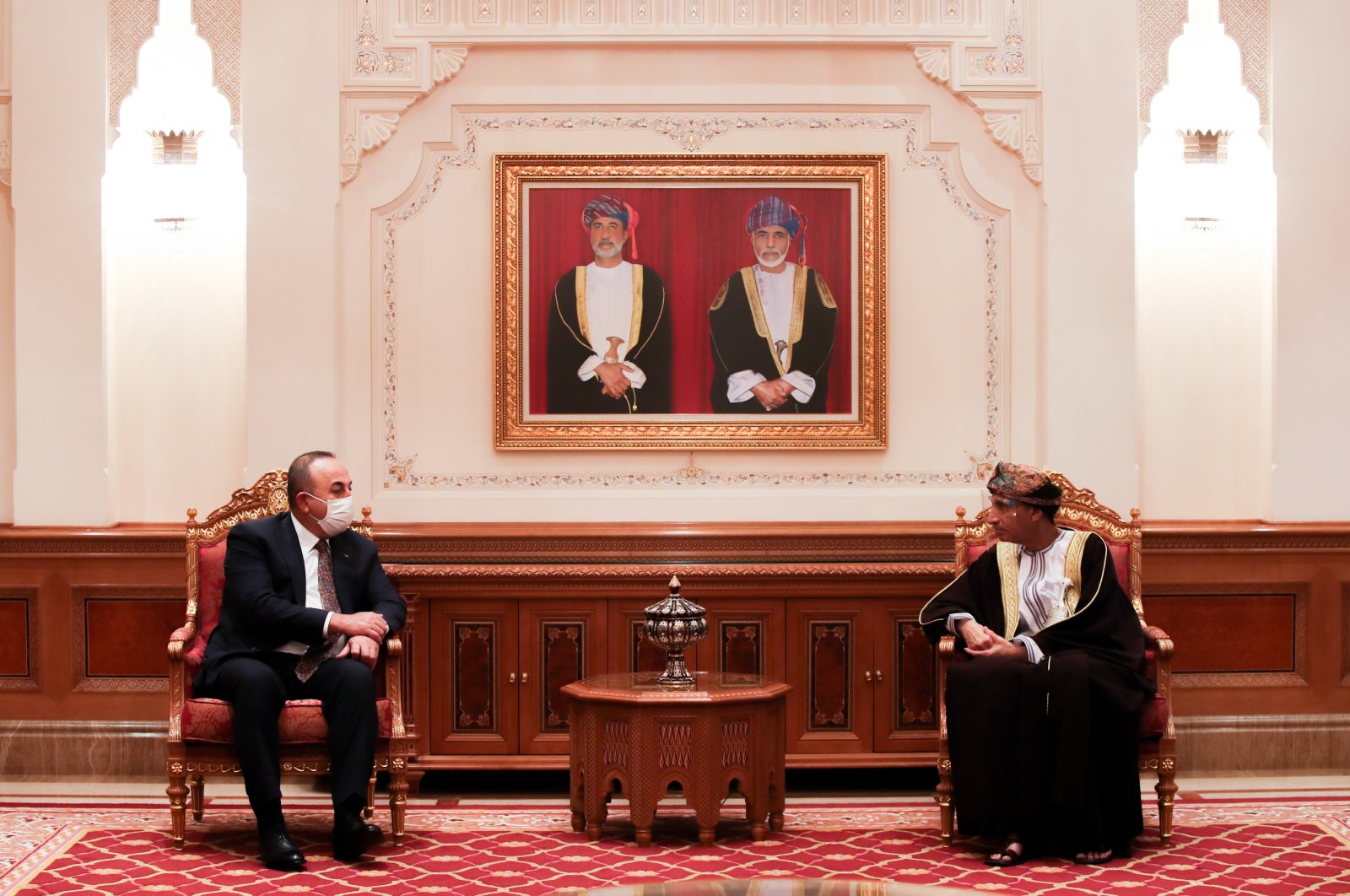 Foreign Minister Mevlüt Çavuşoğlu (L) with his Omani counterpart, Sayyid Badr bin Hamad bin Hamood al-Busaidi, in Muscat, Oman, Feb. 10, 2021. (AA Photo)