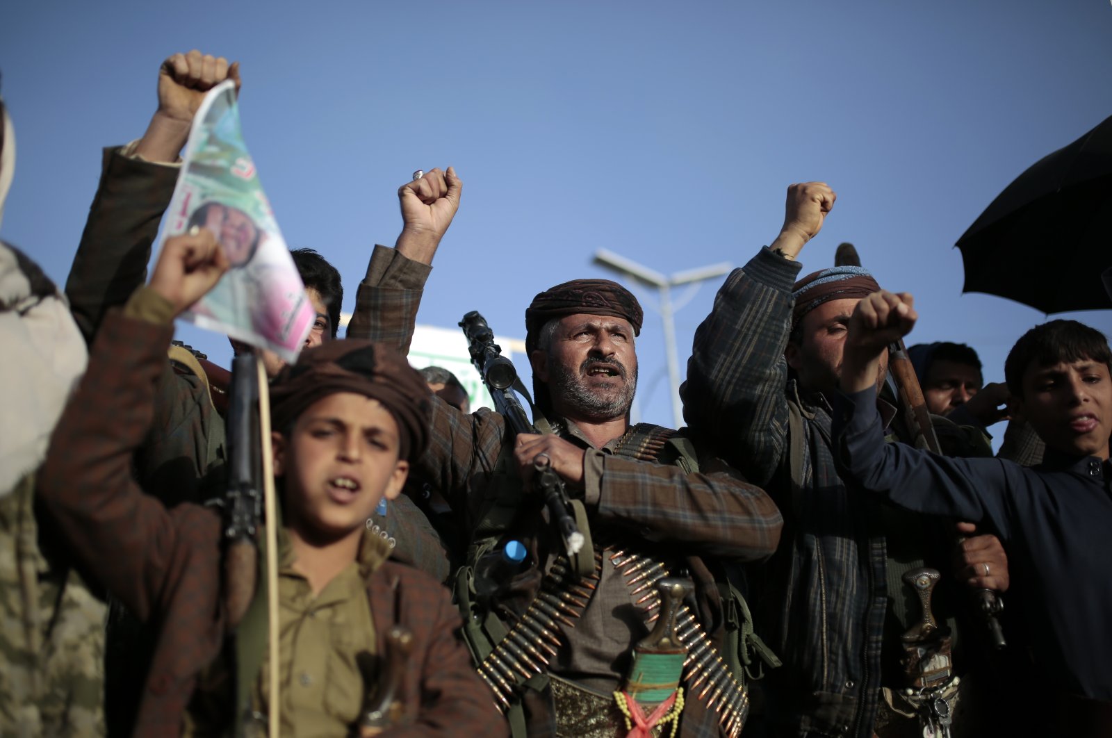Houthi supporters chant slogans as they attend a demonstration against the United States over its decision to designate the Houthis a foreign terrorist organization in Sanaa, Yemen, Jan. 25, 2021. (AP Photo)