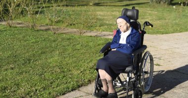 Sister Andre, Lucile Randon in the registry of birth, the eldest French and European citizen, sits in a wheelchair on the eve of her 117th birthday, in an EHPAD (Housing Establishment for Dependant Elderly People) in Toulon, southern France. (AFP Photo)