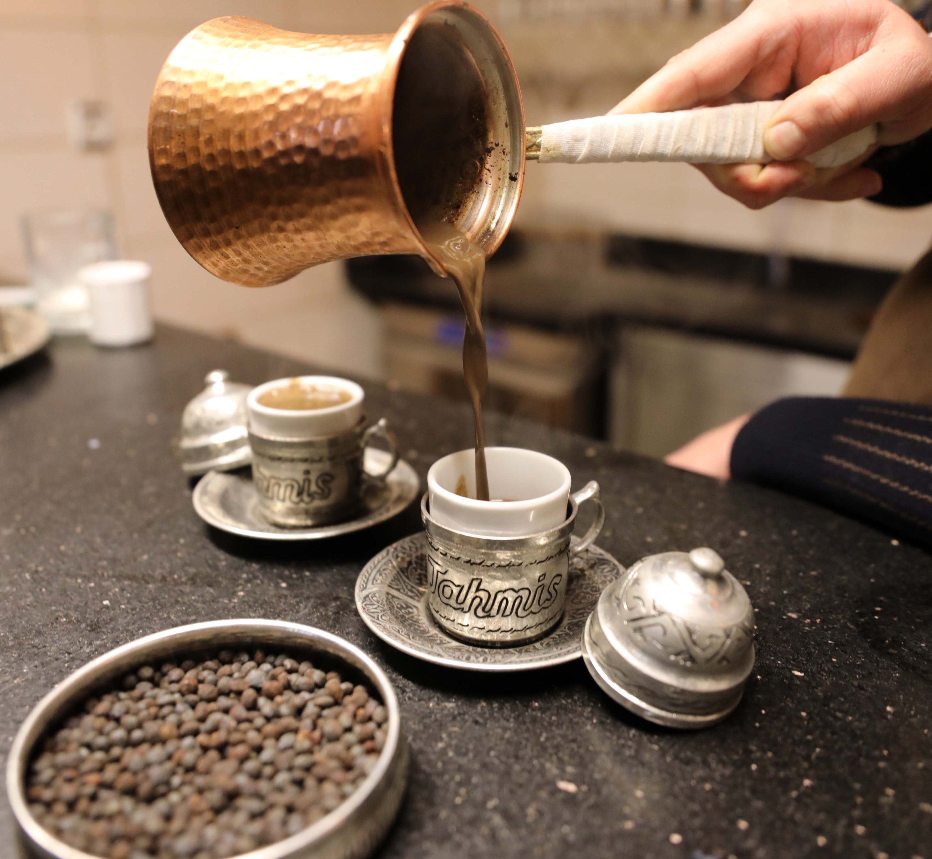 An employee pours a cup of Turkish coffee at a restaurant in Gaziantep, southeastern Turkey, Feb. 5, 2021. 
