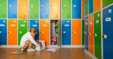 A first-grade child is seen in a classroom in primary school No. 25 on the first day after the Polish authorities allowed the youngest children to leave home education and return to school, amid the COVID-19 pandemic in Warsaw, Poland, Jan. 18, 2021. (AFP Photo)
