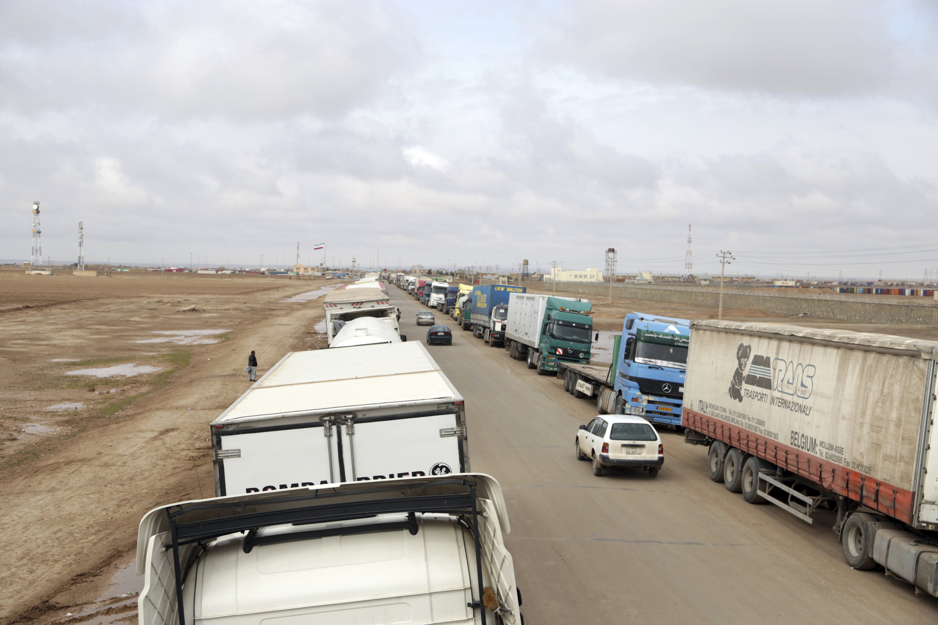 In this Feb. 20, 2019 photo, fuel tankers and trucks are parked on the road at the Islam Qala border with Iran, in Herat Province, west of Kabul, Afghanistan. (AP Photo)
