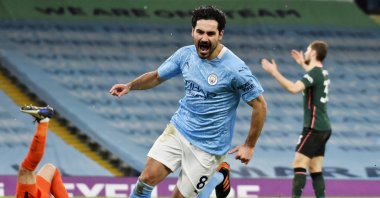 Manchester City's Ilkay Gundogan celebrates scoring the second goal during the Premier League match against Tottenham Hotspur in Manchester, Britain, Feb.13, 2021. (Reuters Photo)