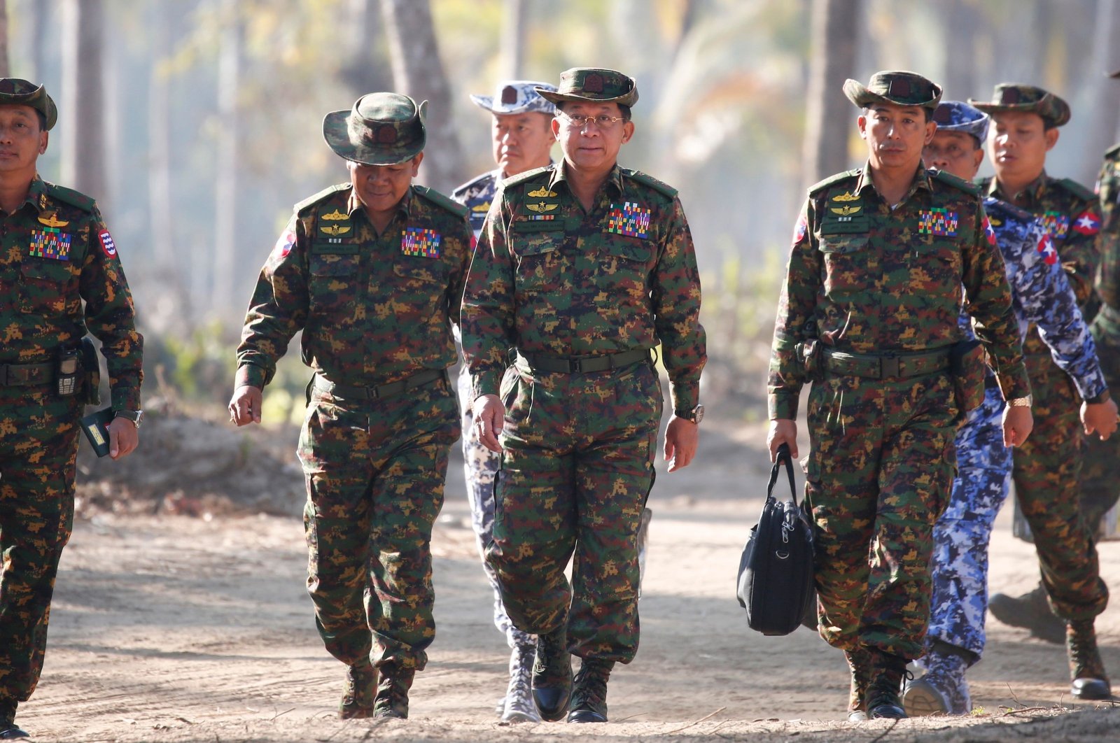 Myanmar military Commander-in-Chief Min Aung Hlaing (4L) and senior military commanders arrive on the second day of the 'Sin Phyu Shin' joint military exercises in the Irrawaddy Delta region, Feb. 3, 2018. (AFP Photo)