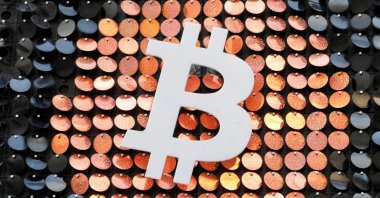 The Bitcoin digital currency logo at a shop in Marseille, France, Feb. 7, 2021. (Reuters Photo)