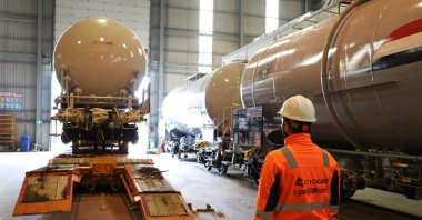 Tank cars are loaded onto trucks for delivery to Iraq in the northwestern Kocaeli province, Turkey, Feb. 13, 2021. (AA Photo)