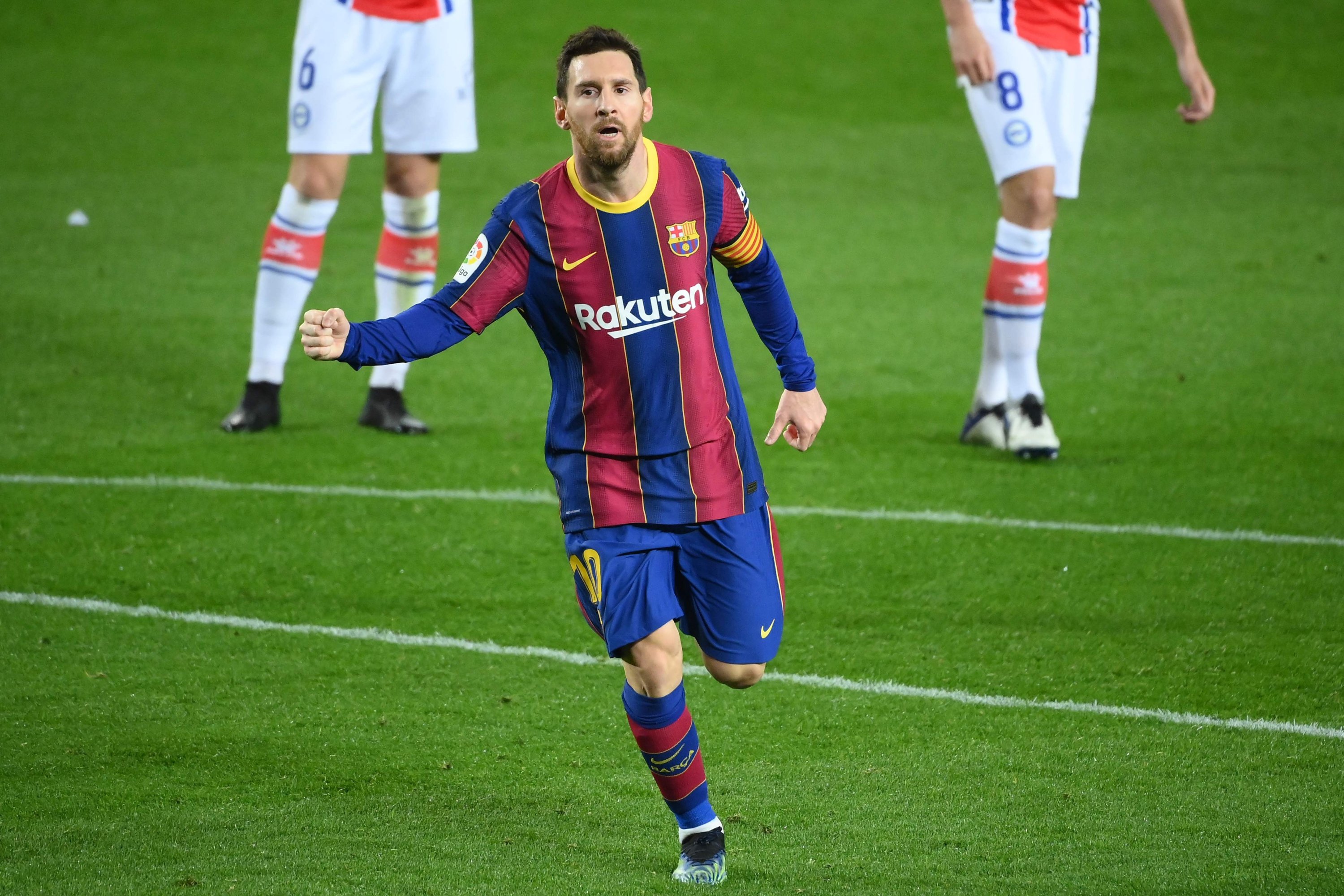 Barcelona's Lionel Messi celebrates scoring a goal against Alaves at the Camp Nou, Barcelona, Spain, Feb. 13, 2021. (AFP Photo)