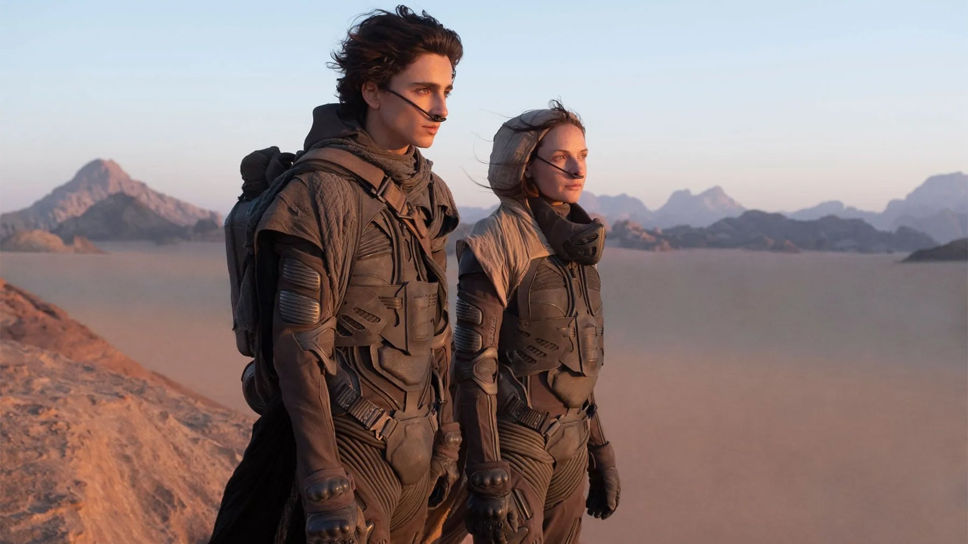 This image released by Legendary Pictures shows Timothee Chalamet (L) and Rebecca Ferguson in "Dune." (Photo courtesy of Legendary Pictures / Warner Bros)