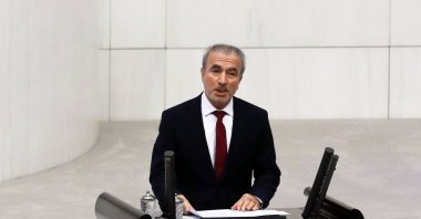 AK Party Group Deputy Chairperson Naci Bostancı speaks at the Turkish Parliament, in the capital Ankara, Turkey, April 23, 2019. (Sabah Photo)
