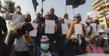 Members of Aam Aadmi Party shout slogans demanding the release of Indian climate activist Disha Ravi, during a protest in Mumbai, India, Feb. 15, 2021. (AP Photo)