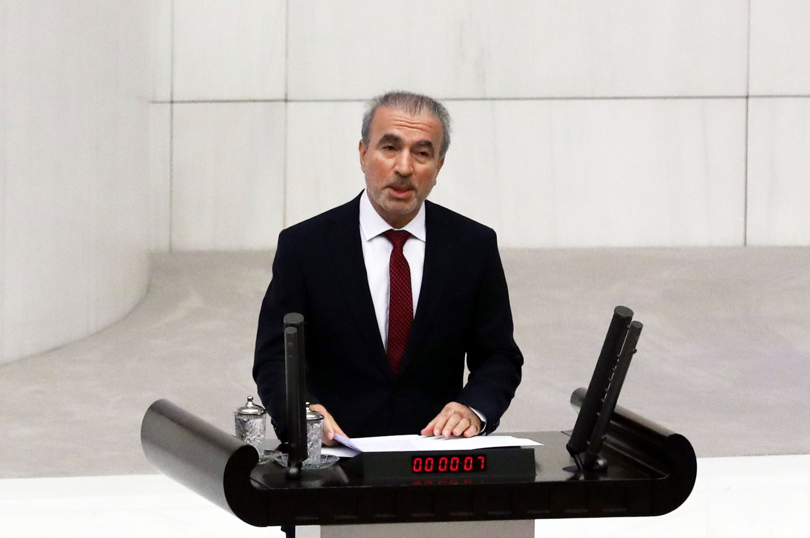 AK Party Group Deputy Chairperson Naci Bostancı speaks at the Turkish Parliament, in the capital Ankara, Turkey, April 23, 2019. (Sabah Photo)