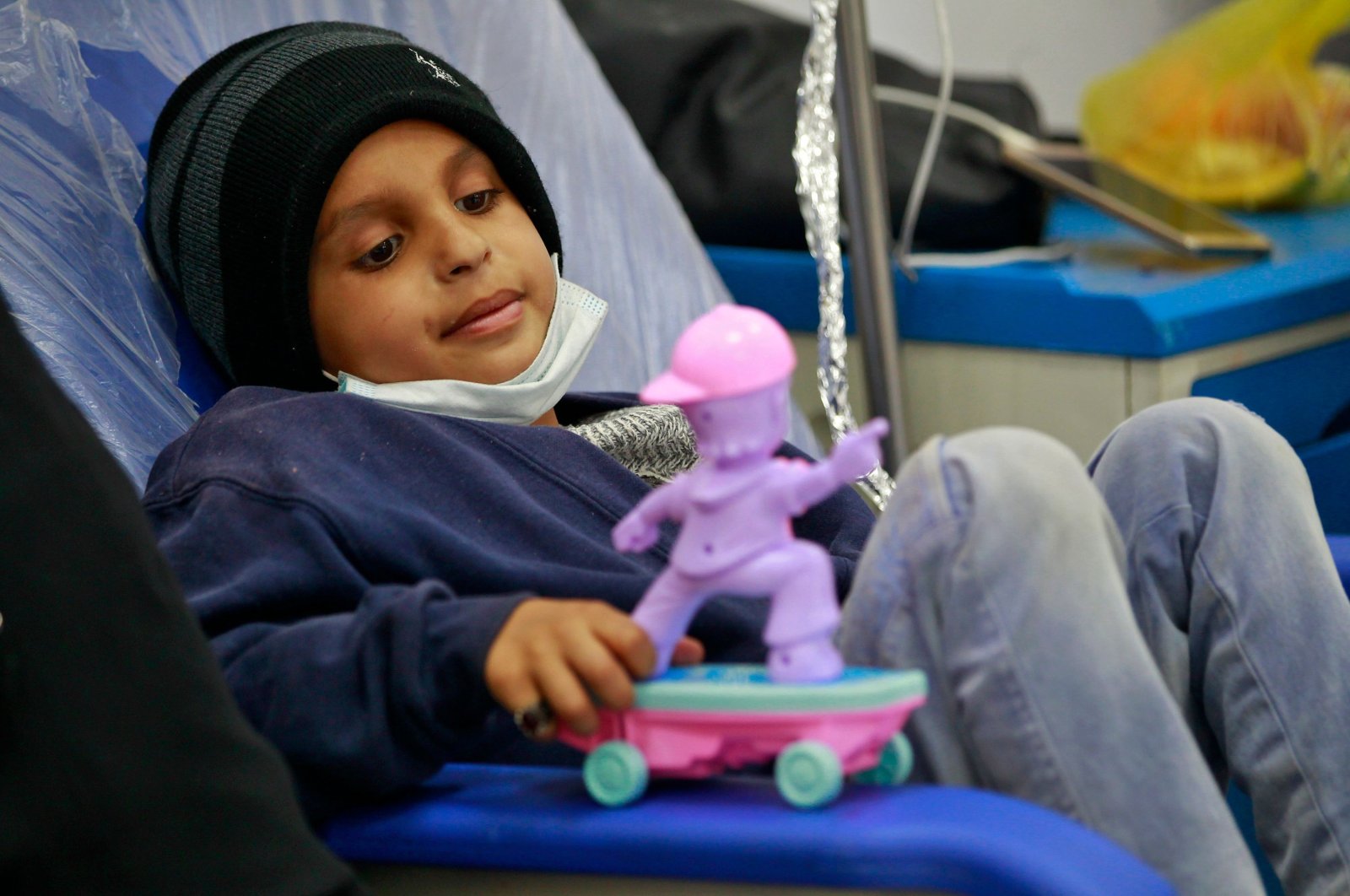 A child suffering from blood cancer, or leukemia, receives treatment at an oncology ward of a hospital in the Yemeni capital Sanaa, on World Cancer Day, Feb. 4, 2021. (AFP Photo)