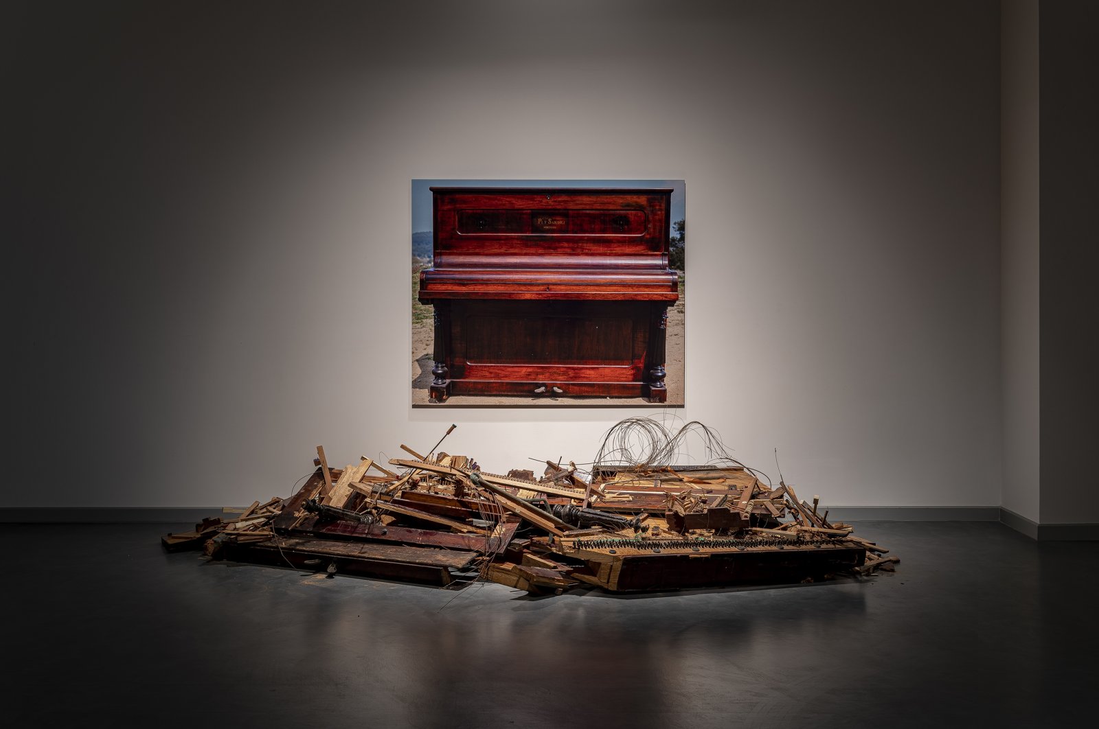 Carles Santos, "Destroyed Piano with Photograph," 2008, destroyed piano, color photography. (Courtesy of Arter) 