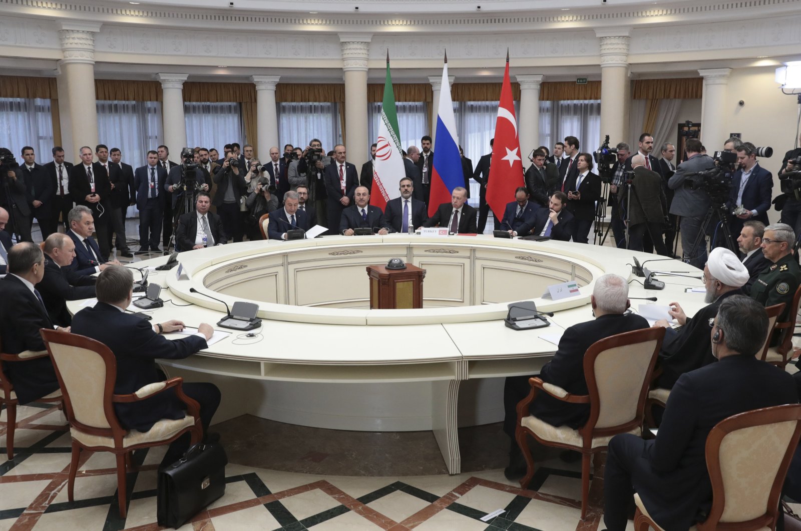 President Recep Tayyip Erdoğan, Russian President Vladimir Putin and Iranian President Hassan Rouhani head their delegations during their meeting in the Black Sea resort of Sochi, Russia, Feb. 14, 2019. (AP Photo)