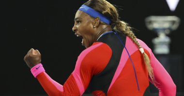 U.S.' Serena Williams reacts after winning a point against Romania's Simona Halep during their quarterfinal match at the Australian Open tennis championship in Melbourne, Australia, Feb. 16, 2021. (AP Photo)