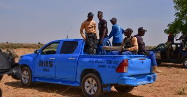 Nigerian security forces are seen on the site of a sabotage attack allegedly perpetrated by Boko Haram against electrical infrastructures on the outskirts of Maiduguri on Feb. 12, 2021. (AFP Photo)