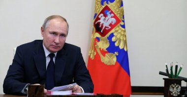 Russian President Vladimir Putin attends a meeting with leaders of the state Duma, the lower house of the Russian parliament factions via videoconference at the Novo-Ogaryovo outside Moscow, Russia, Feb. 17, 2021. (AP Photo)