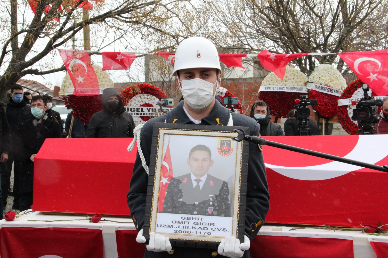 The funeral of Specialized Gendermarie Sgt. Ümit Gıcır who was killed in the PKK's cave attack in northern Iraq's Gara, in Balıkesir, western Turkey, Feb. 15, 2021. (AA Photo)