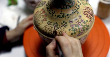 A Seljuk tile pitcher produced at the workshop of the Selçuklu Municipality in Konya, central Turkey, Feb. 16, 2021. (AA Photo)