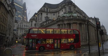 A bus passes the Bank of England amid the coronavirus pandemic, London, Britain, Feb. 15, 2021. (Photo by Getty Images)