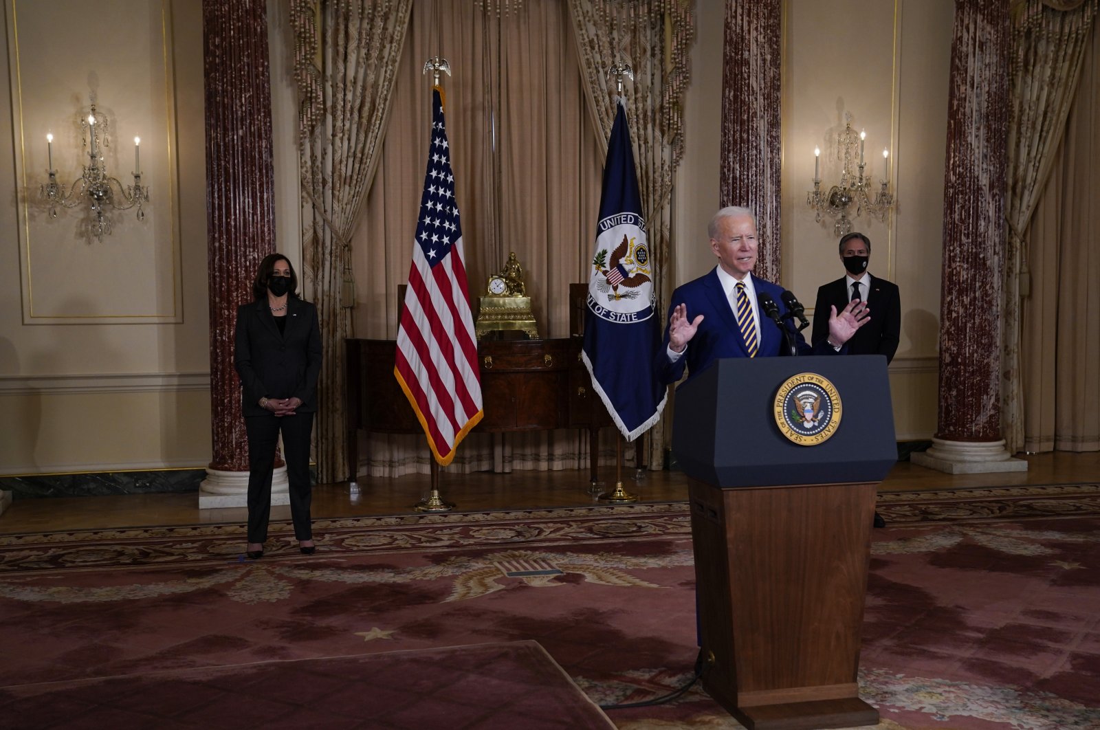 U.S. President Joe Biden speaks on foreign policy, while U.S. Vice President Kamala Harris (L) and Secretary of State Antony Blinken listen, Washington, D.C., U.S., Feb. 4, 2021. (AP Photo)