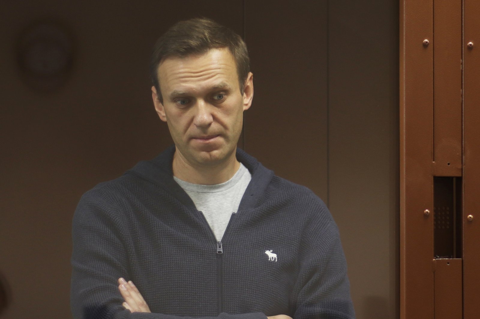 Kremlin critic Alexei Navalny stands inside a defendant dock during a court hearing in Moscow, Russia, Feb. 12, 2021. (Reuters Photo)