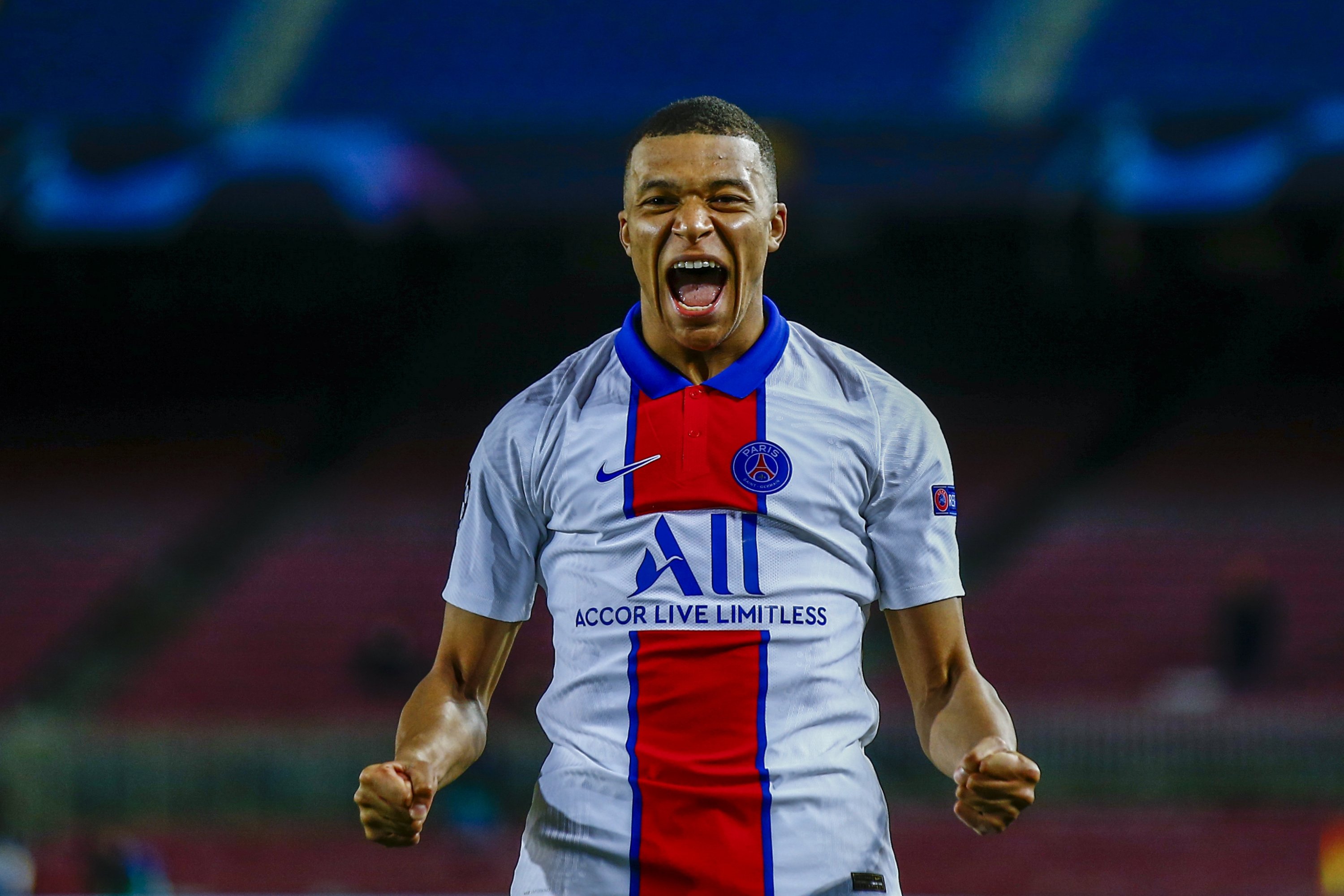 PSG's Kylian Mbappe celebrates after scoring a goal against Barcelona in the Champions League round of 16, first leg match at the Camp Nou, Barcelona, Spain, Feb. 16, 2021. (AP Photo)