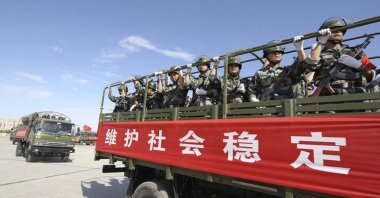 Armed members from a Chinese militia take part in a joint exercise in Hami, Uighur Autonomous Region, July 2, 2013. (Reuters Photo)