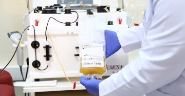 A health worker holds a bag containing plasma at a Turkish Red Crescent donation center in the capital Ankara, Turkey, April 7, 2020. (AA Photo)