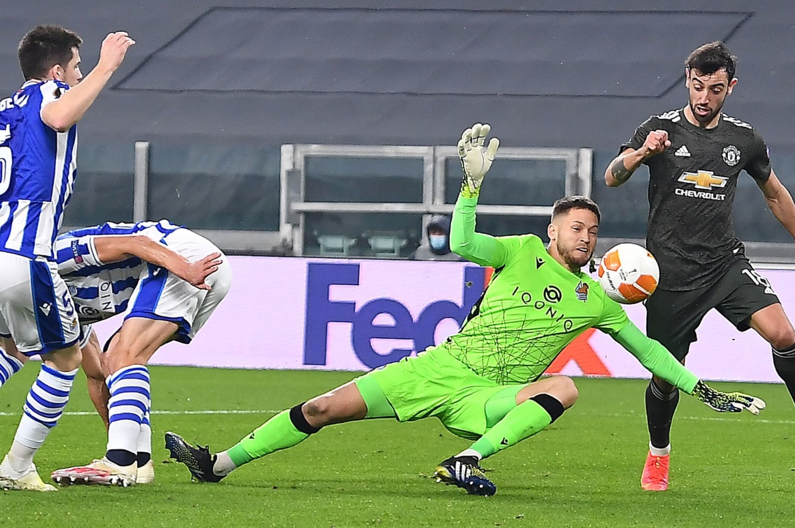 Manchester United’s Bruno Fernandes (R) on his way to scoring the opening goal against Real Sociedad in the UEFA Europa League round of 32 match at the Allianz Stadium, Turin, Italy, Feb. 18, 2021. (EPA Photo)
