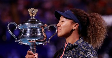 Japan's Naomi Osaka celebrates with the trophy after winning her final match against Jennifer Brady of the U.S, Feb. 20, 2021. (Reuters Photo)