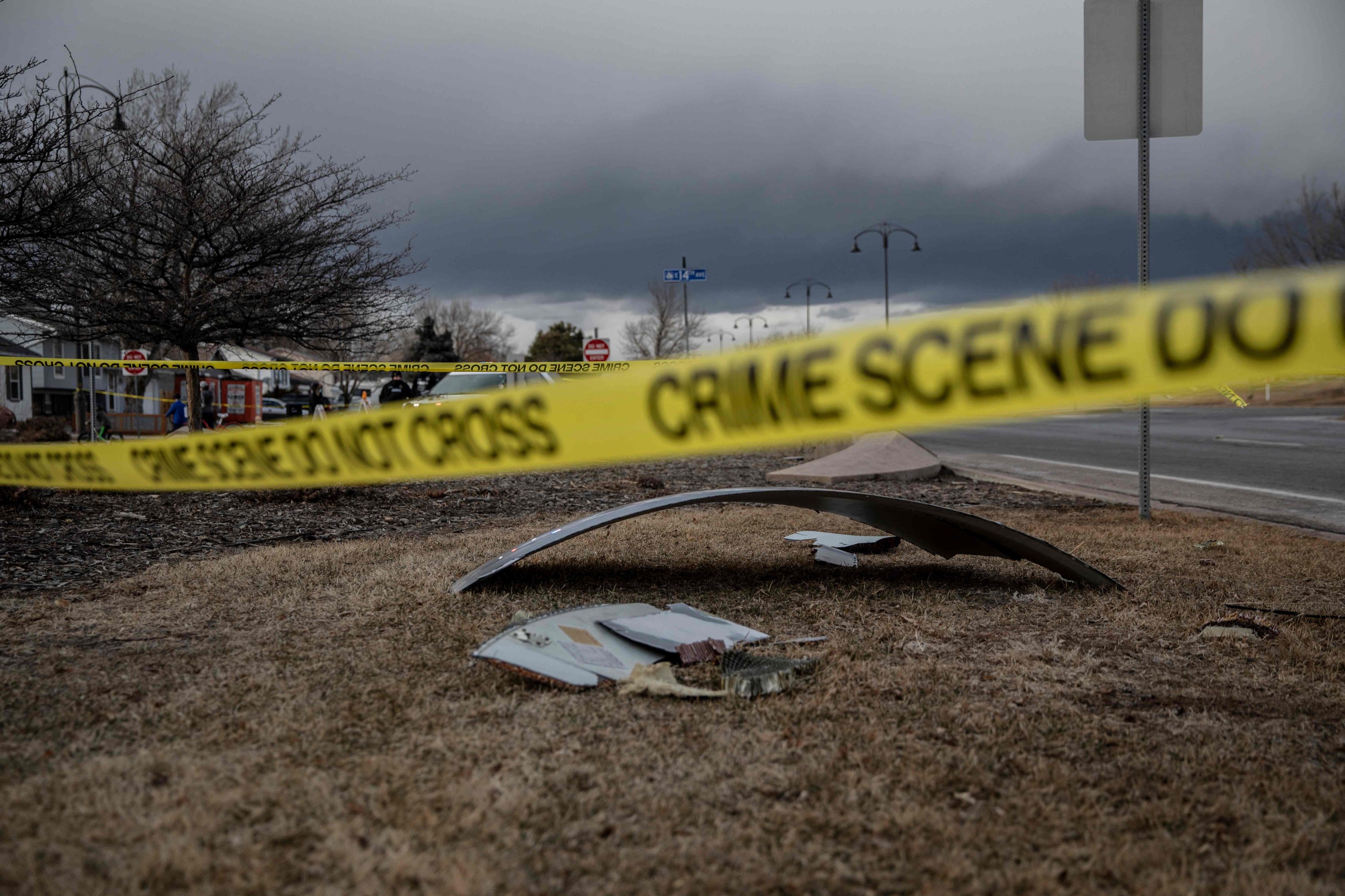 Debris fallen from a United Airlines airplane's engine lay scattered throughout the neighborhood of Broomfield, outside Denver, Colorado, U.S., Feb. 20, 2021. (AFP Photo)