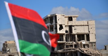 A damaged building is seen as Libyans mark the 10th anniversary of the 2011 uprising that led to the ousting and killing of longtime ruler Moammar Gadhafi, in Benghazi, Libya, Feb. 17, 2021. (AP Photo)