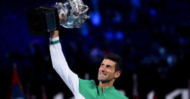 Serbia's Novak Djokovic lifts the trophy after winning the Australian Open men's singles finals against Russia's Daniil Medvedev at Melbourne Park, Melbourne, Australia, Feb. 21, 2021.  (EPA Photo)